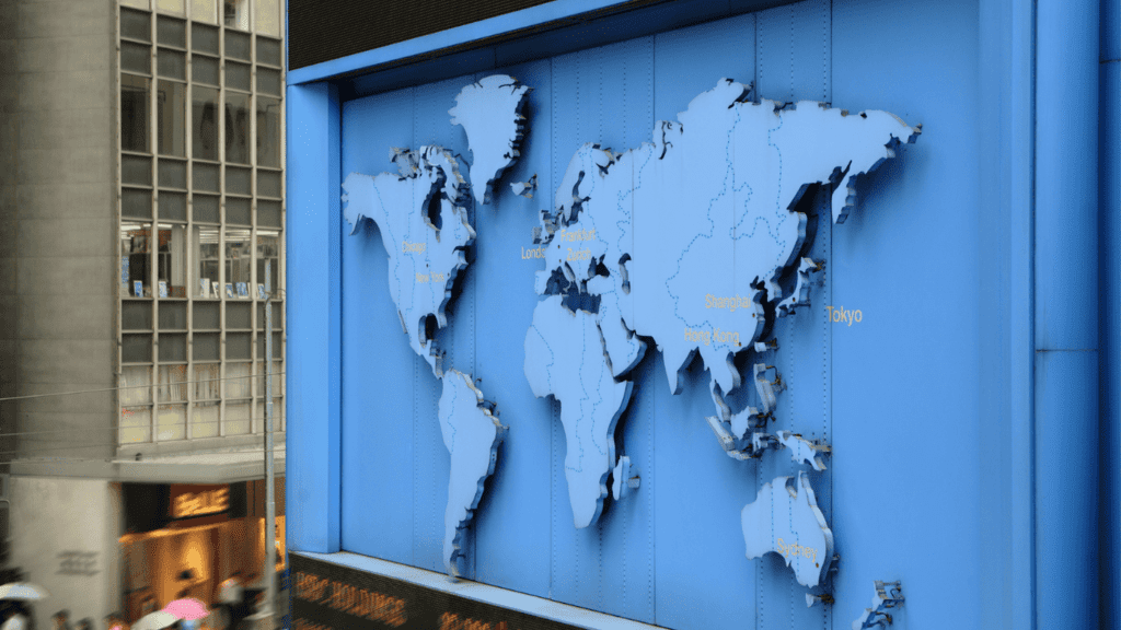 Map showing global cities in various time zones, representing a 24/7 multilingual support team.