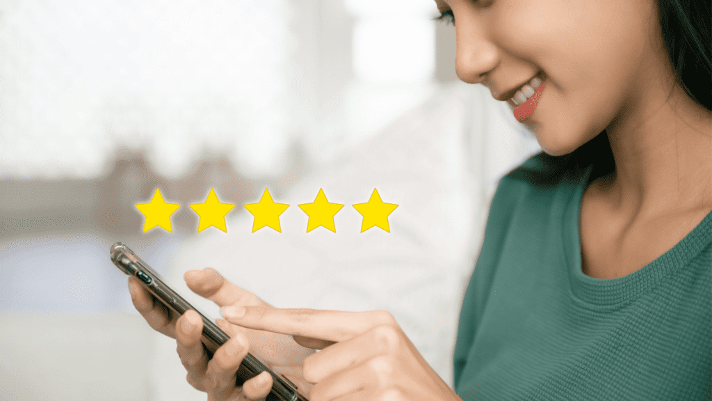 Happy customer looking at her phone, with a five-star rating overlay, reflecting satisfaction with a round-the-clock multilingual call centre.