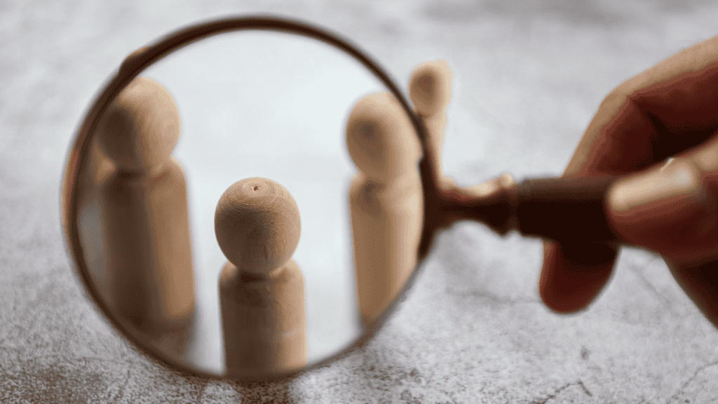 Tailored customer service with around the clock multilingual support represented by a magnifying glass.