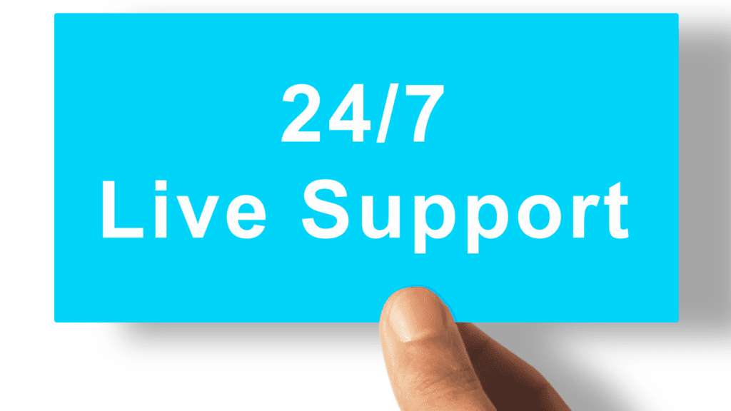 A hand holding a blue card with the text "24/7 Live Support" in bold white letters