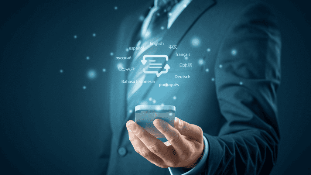 A businessperson in a suit holding a phone with a holographic display of various global languages, representing multilingual communication and solutions.
