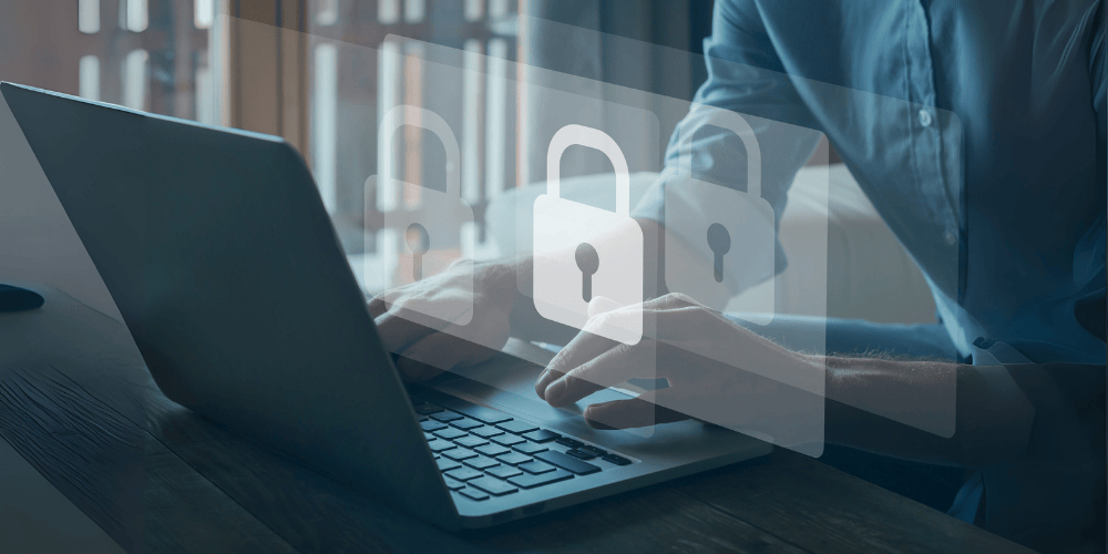 Person typing on a laptop with padlock icons, symbolising secure data handling in customer service.